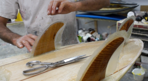9. Apply your fin rope and fin patches to the fins in order to glass them to the board.